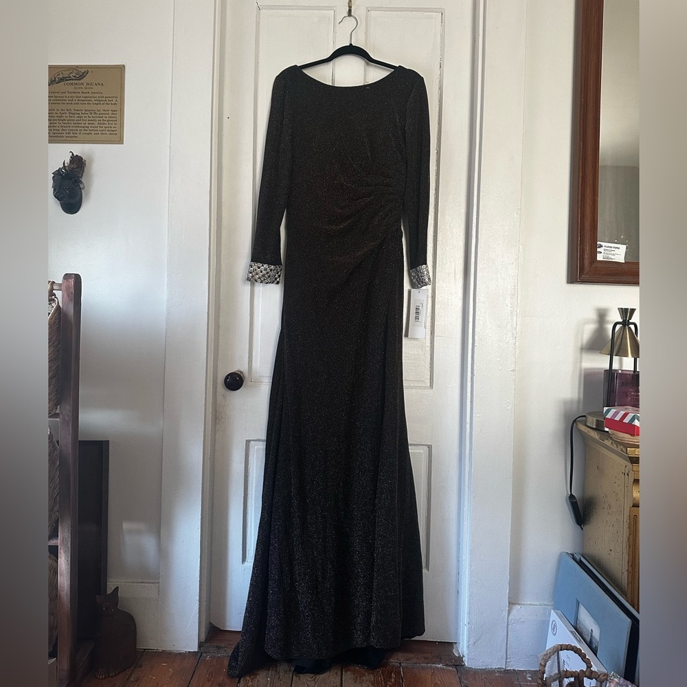 Golden floor length gown with beaded sleeve details